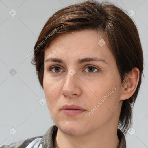 Neutral white young-adult female with medium  brown hair and brown eyes