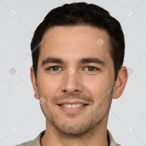 Joyful white young-adult male with short  brown hair and brown eyes