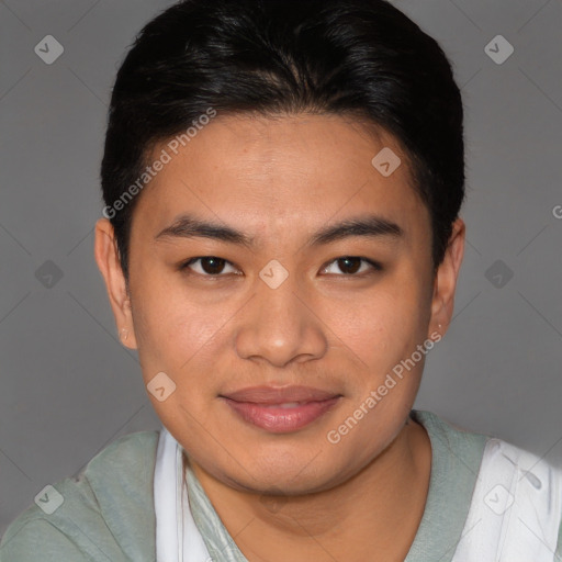 Joyful asian young-adult male with short  brown hair and brown eyes