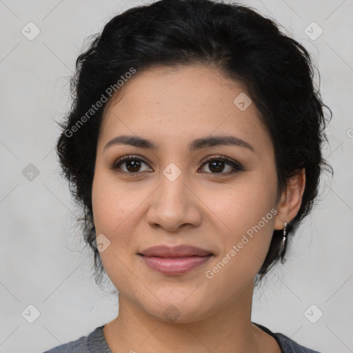 Joyful latino young-adult female with medium  black hair and brown eyes