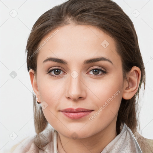 Joyful white young-adult female with medium  brown hair and grey eyes