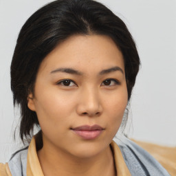 Neutral asian young-adult female with medium  brown hair and brown eyes