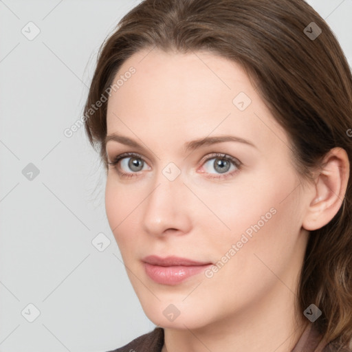 Neutral white young-adult female with medium  brown hair and grey eyes