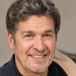 Joyful white middle-aged male with short  brown hair and brown eyes