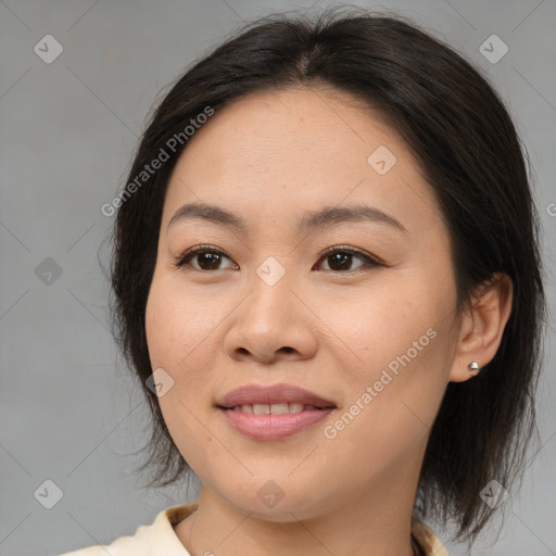 Joyful asian young-adult female with medium  brown hair and brown eyes