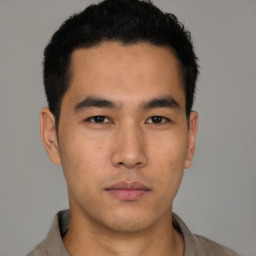 Neutral asian young-adult male with short  black hair and brown eyes