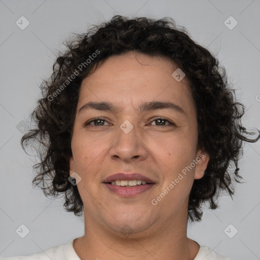 Joyful white adult female with short  brown hair and brown eyes