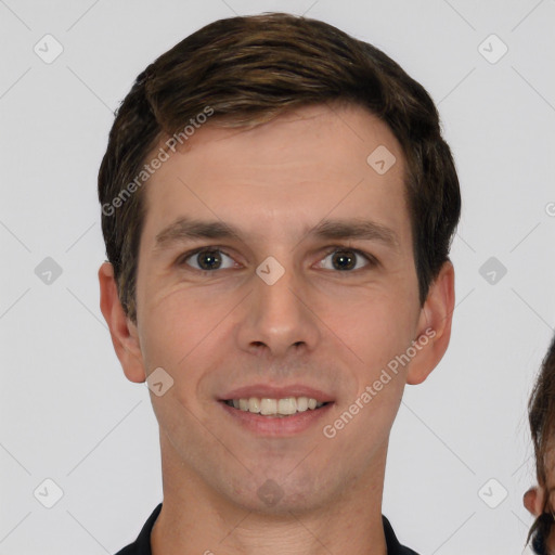 Joyful white young-adult male with short  brown hair and brown eyes