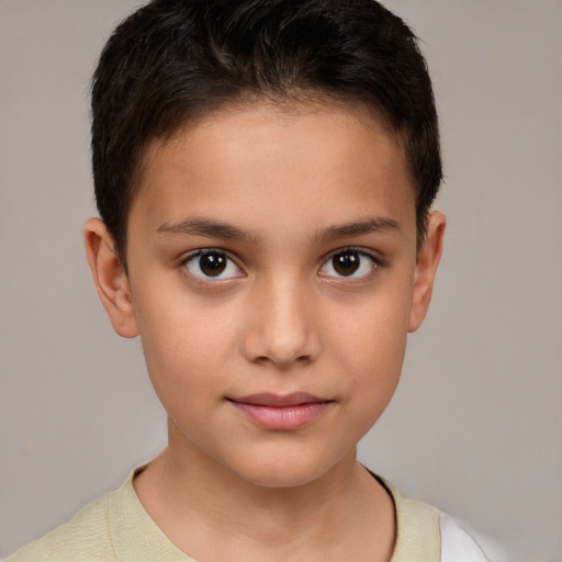 Joyful white child female with short  brown hair and brown eyes