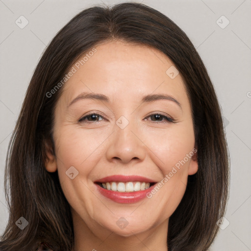 Joyful white adult female with medium  brown hair and brown eyes