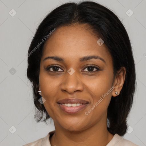 Joyful black young-adult female with medium  brown hair and brown eyes