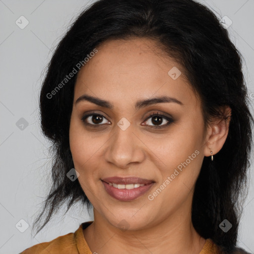 Joyful latino young-adult female with medium  brown hair and brown eyes