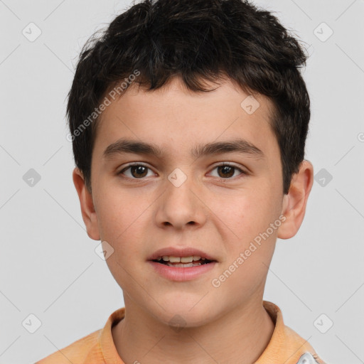 Joyful white child male with short  brown hair and brown eyes