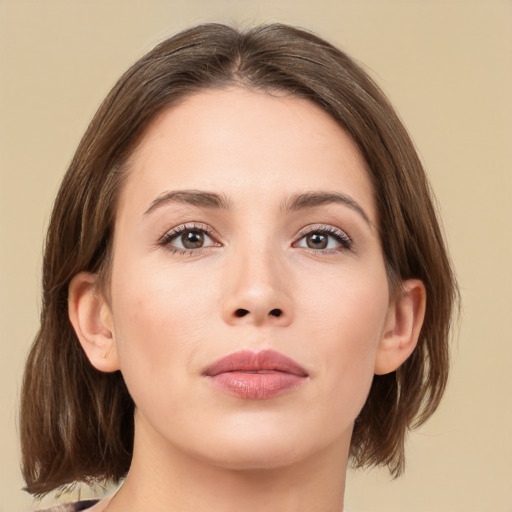 Neutral white young-adult female with medium  brown hair and brown eyes