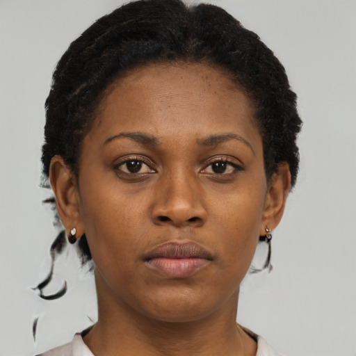 Neutral black adult female with short  brown hair and brown eyes