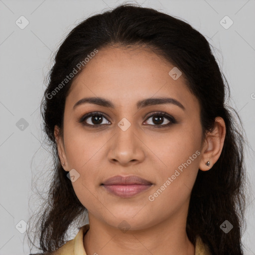 Joyful latino young-adult female with long  brown hair and brown eyes