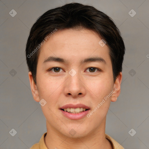 Joyful asian young-adult male with short  brown hair and brown eyes