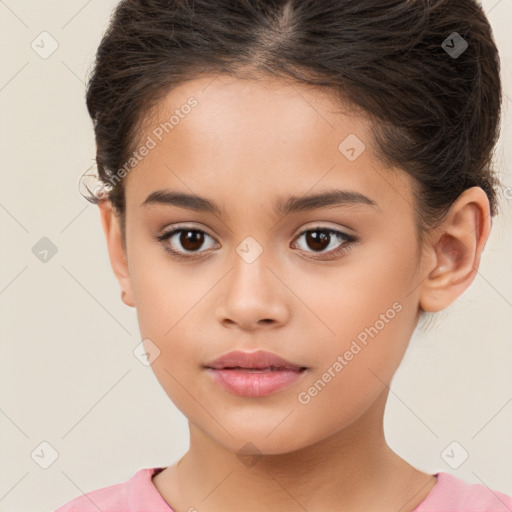 Joyful white child female with short  brown hair and brown eyes