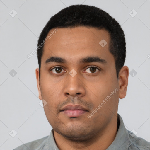 Neutral latino young-adult male with short  black hair and brown eyes