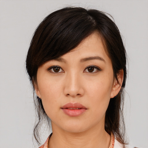 Neutral asian young-adult female with medium  black hair and brown eyes