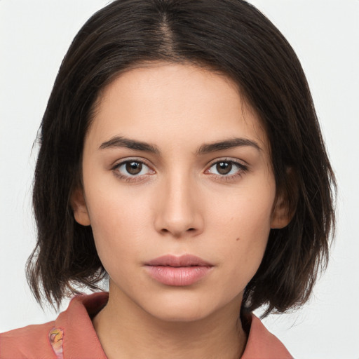 Neutral white young-adult female with medium  brown hair and brown eyes