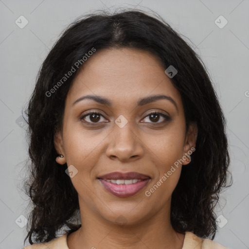 Joyful black young-adult female with medium  brown hair and brown eyes