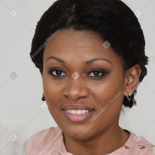 Joyful black young-adult female with short  black hair and brown eyes