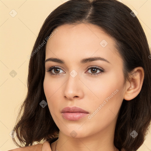 Neutral white young-adult female with long  brown hair and brown eyes