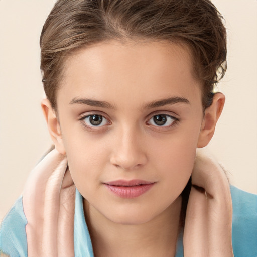 Joyful white child female with long  brown hair and brown eyes