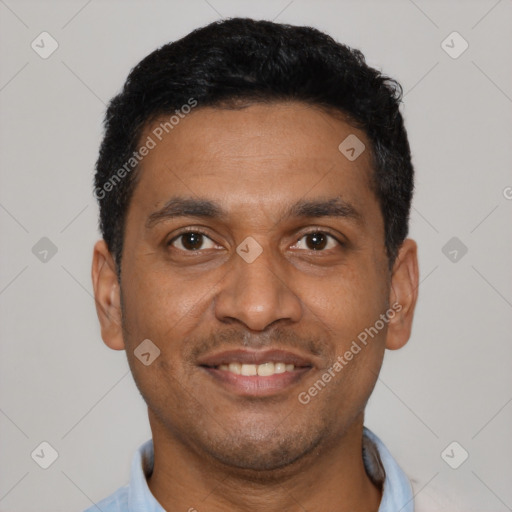 Joyful latino young-adult male with short  black hair and brown eyes