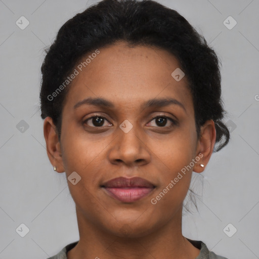 Joyful black young-adult female with short  brown hair and brown eyes