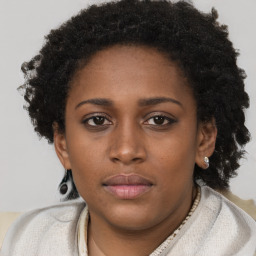 Neutral black young-adult female with short  brown hair and brown eyes