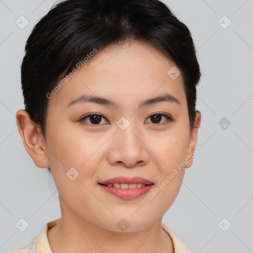 Joyful asian young-adult female with short  brown hair and brown eyes