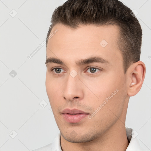 Neutral white young-adult male with short  brown hair and brown eyes