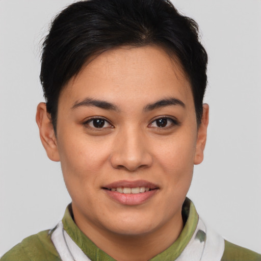 Joyful asian young-adult female with short  brown hair and brown eyes