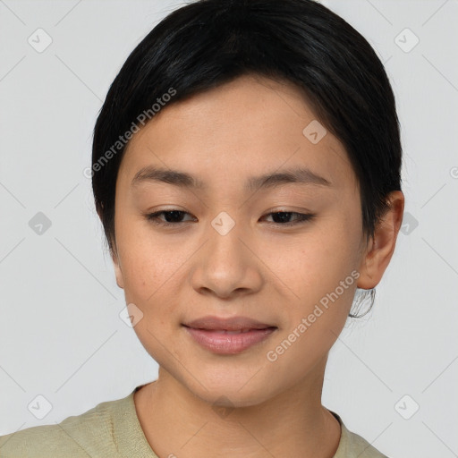 Joyful asian young-adult female with short  brown hair and brown eyes