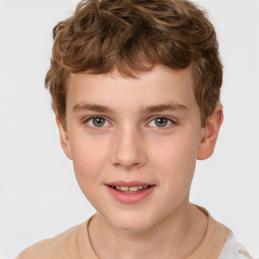 Joyful white child male with short  brown hair and brown eyes