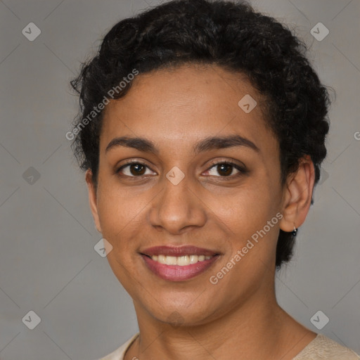 Joyful latino young-adult female with short  brown hair and brown eyes