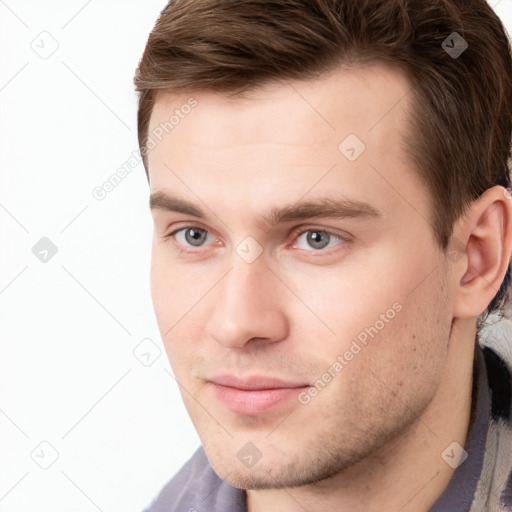 Neutral white young-adult male with short  brown hair and grey eyes