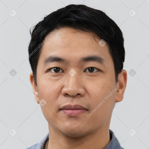 Neutral asian young-adult male with short  black hair and brown eyes