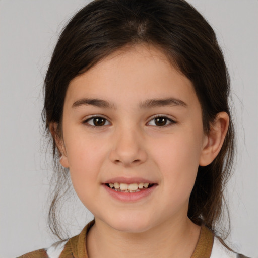 Joyful white child female with medium  brown hair and brown eyes