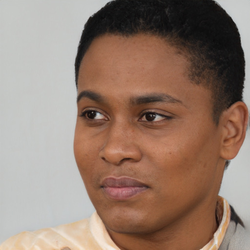 Neutral black young-adult male with short  black hair and brown eyes