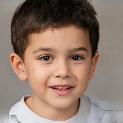 Joyful white child male with short  brown hair and brown eyes