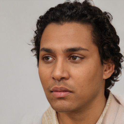 Neutral white young-adult male with short  black hair and brown eyes
