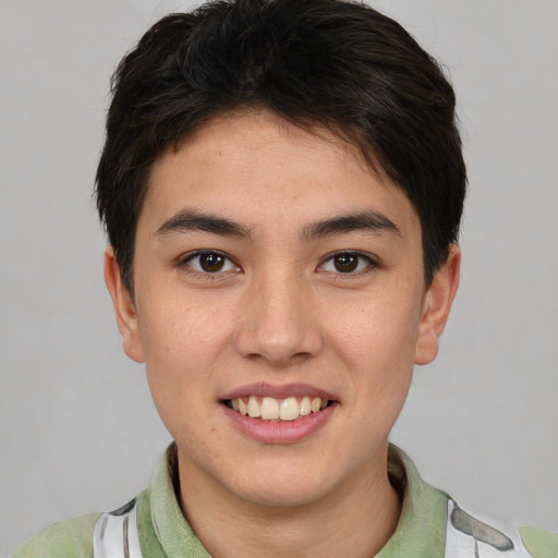 Joyful asian young-adult male with short  brown hair and brown eyes