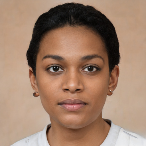 Neutral black young-adult female with short  black hair and brown eyes