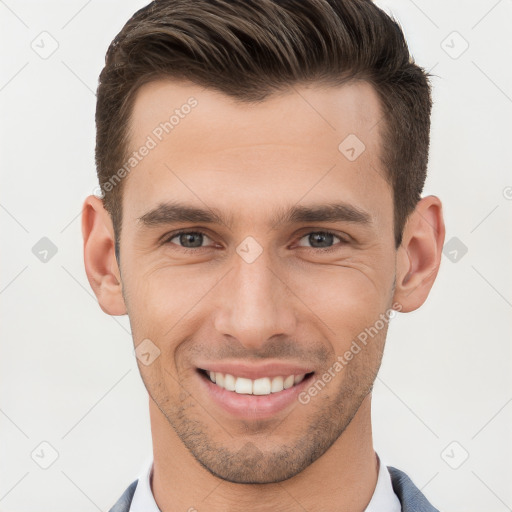 Joyful white young-adult male with short  brown hair and brown eyes