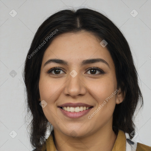 Joyful latino young-adult female with medium  brown hair and brown eyes