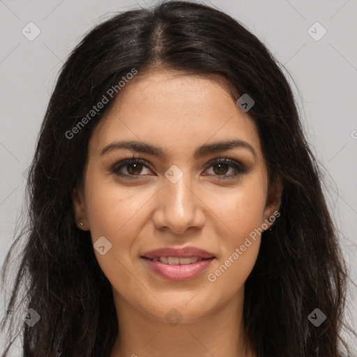 Joyful latino young-adult female with long  brown hair and brown eyes