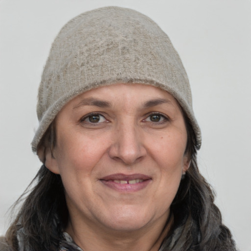 Joyful white adult female with short  brown hair and grey eyes